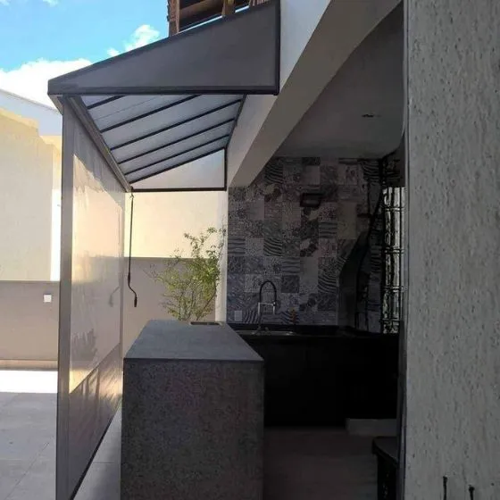 Reforma de Toldos e Coberturas em Mogi das Cruzes - SP — Instalação em fachada comercial
